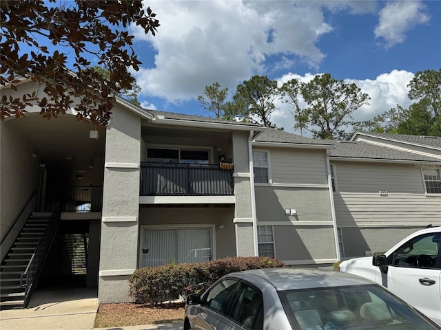 3705 SW 27th St Unit 214, Gainesville, FL 32608 - view of building exterior with stairs