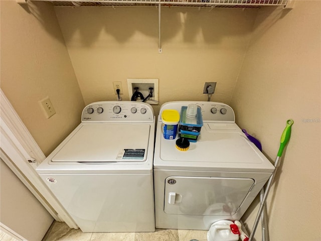 3705 SW 27th St Unit 214, Gainesville, FL 32608 - washroom with washer and dryer