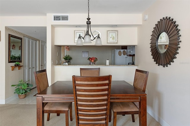 2595 Countryside Blvd Unit 8205, Clearwater, FL 33761 - dining room featuring baseboards and visible vents