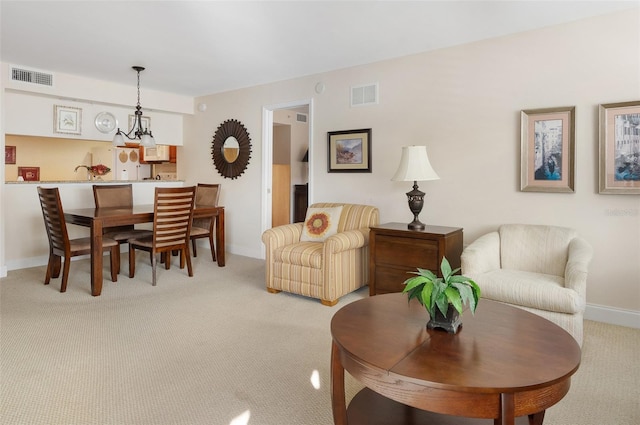 2595 Countryside Blvd Unit 8205, Clearwater, FL 33761 - living room with visible vents, baseboards, and light carpet