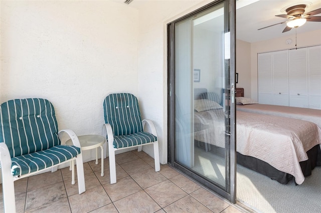 2595 Countryside Blvd Unit 8205, Clearwater, FL 33761 - bedroom with a ceiling fan, light tile patterned floors, and a closet