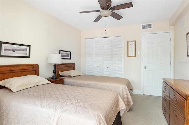 2595 Countryside Blvd Unit 8205, Clearwater, FL 33761 - bedroom with a closet, a ceiling fan, light colored carpet, and visible vents