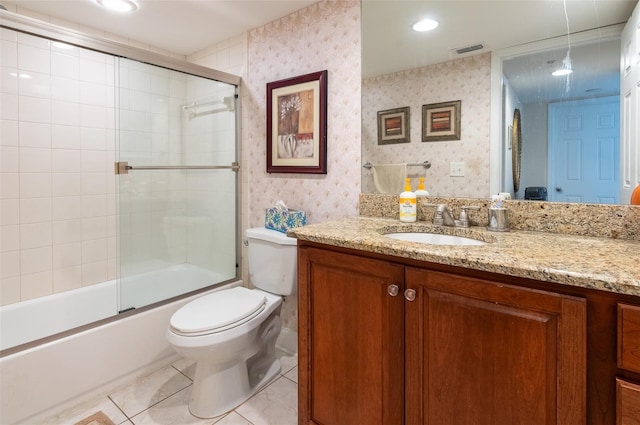 2595 Countryside Blvd Unit 8205, Clearwater, FL 33761 - full bath with visible vents, vanity, toilet, wallpapered walls, and enclosed tub / shower combo
