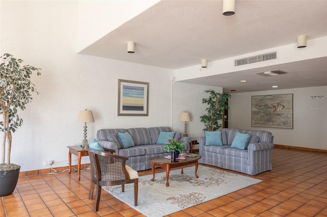 2595 Countryside Blvd Unit 8205, Clearwater, FL 33761 - living area featuring visible vents, baseboards, and light tile patterned floors