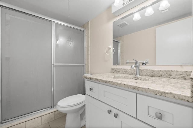 381 S Mcmullen Booth Rd Unit 72, Clearwater, FL 33759 - bathroom featuring toilet, visible vents, tile patterned flooring, and a stall shower