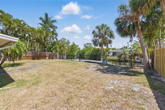 view of yard with fence