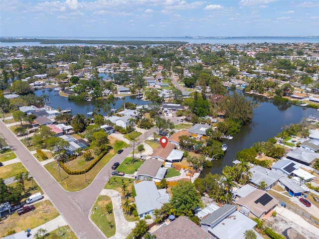 bird's eye view with a water view and a residential view