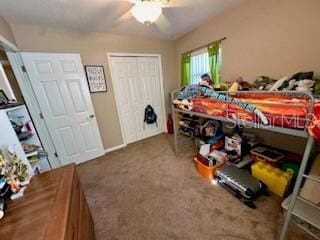 5443 Tangerine Dr, New Port Richey, FL 34652 - bedroom featuring carpet, ceiling fan, and a closet