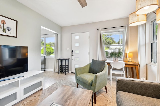3626 17th St N, Saint Petersburg, FL 33713 - living room featuring baseboards and a healthy amount of sunlight