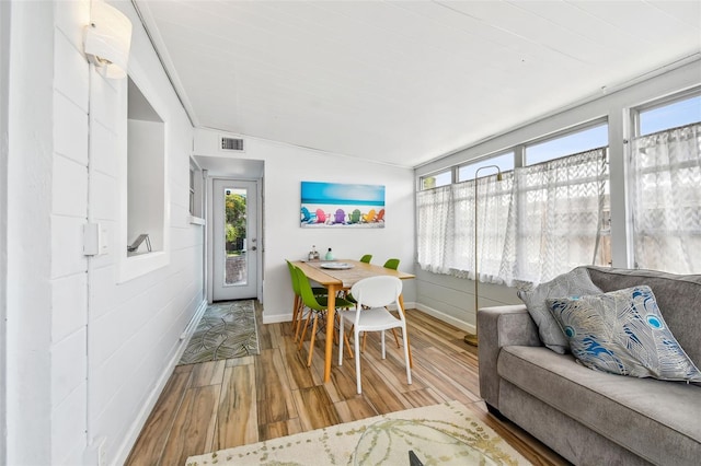 3626 17th St N, Saint Petersburg, FL 33713 - sunroom with a wealth of natural light, visible vents, wood finished floors, and baseboards