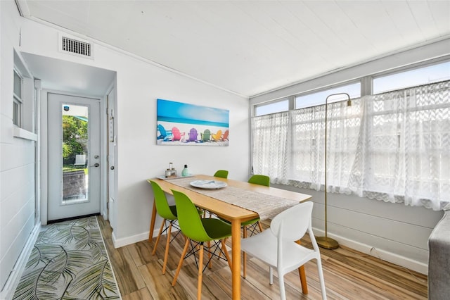 3626 17th St N, Saint Petersburg, FL 33713 - dining room featuring baseboards, visible vents, and wood finished floors