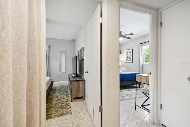 3626 17th St N, Saint Petersburg, FL 33713 - corridor featuring baseboards and speckled floor