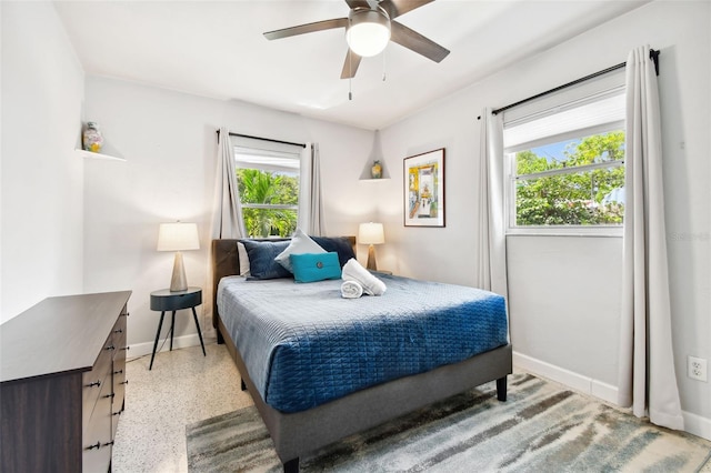 3626 17th St N, Saint Petersburg, FL 33713 - bedroom with ceiling fan, baseboards, and light speckled floor