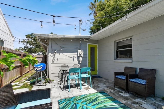 3626 17th St N, Saint Petersburg, FL 33713 - view of patio with outdoor dining area, fence, an outdoor living space, and grilling area