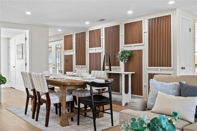 dining space featuring recessed lighting, visible vents, and light wood-type flooring