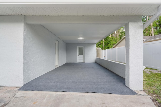 view of patio / terrace featuring fence