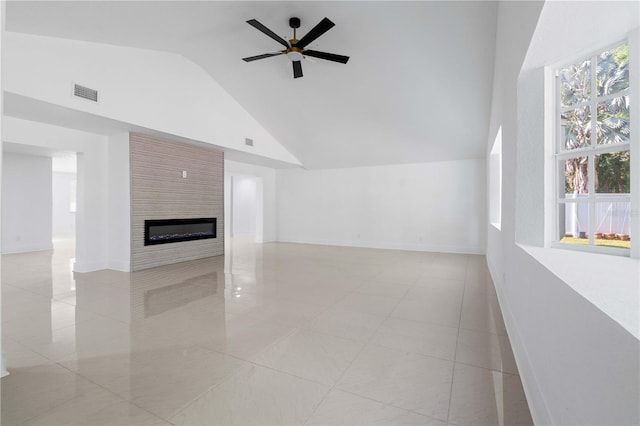unfurnished living room featuring visible vents, light tile patterned flooring, a fireplace, baseboards, and a ceiling fan