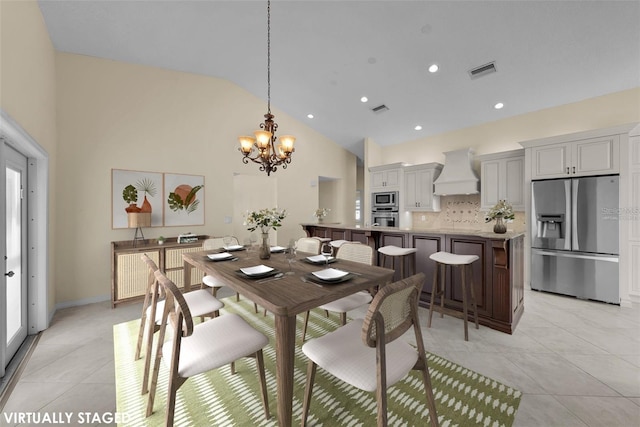 5290 White Sand Cir NE, Saint Petersburg, FL 33703 - dining room featuring a chandelier, light tile patterned floors, high vaulted ceiling, and recessed lighting