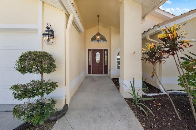 5290 White Sand Cir NE, Saint Petersburg, FL 33703 - doorway to property featuring stucco siding