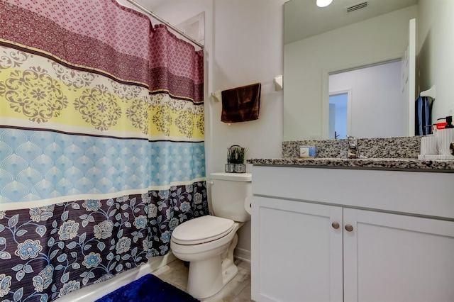 bathroom featuring vanity, toilet, tile patterned floors, curtained shower, and visible vents