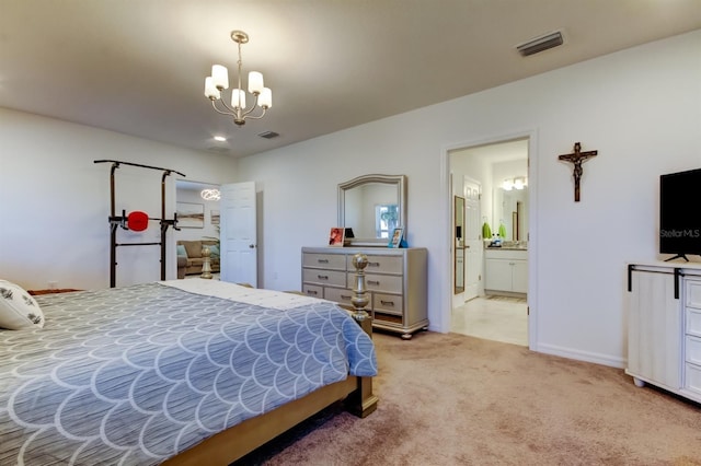bedroom with an inviting chandelier, connected bathroom, visible vents, and light colored carpet