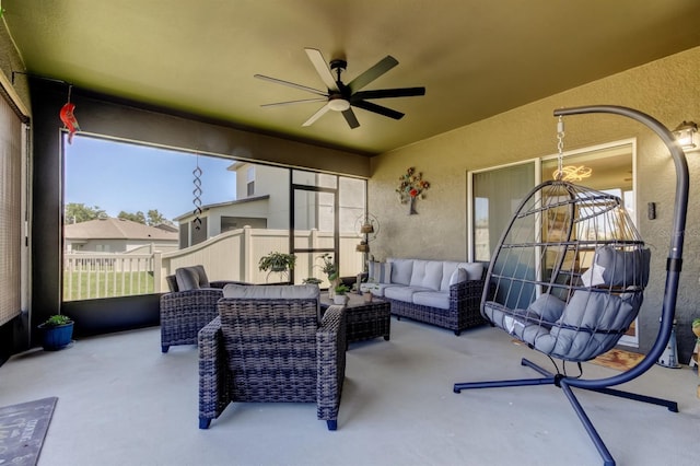 view of patio featuring outdoor lounge area and a ceiling fan