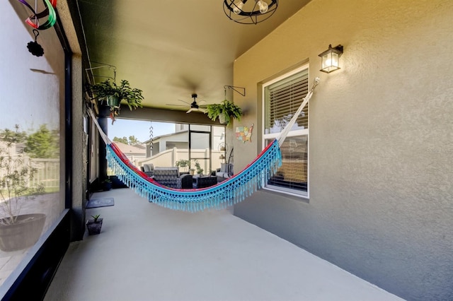 view of patio featuring ceiling fan