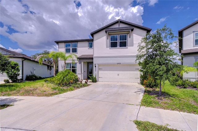 traditional-style home with an attached garage and driveway