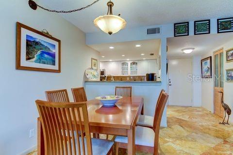 dining area featuring visible vents