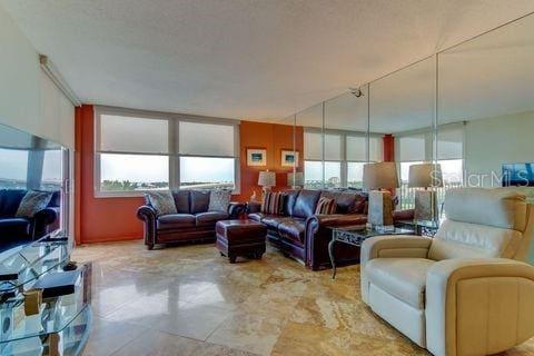 living room with plenty of natural light