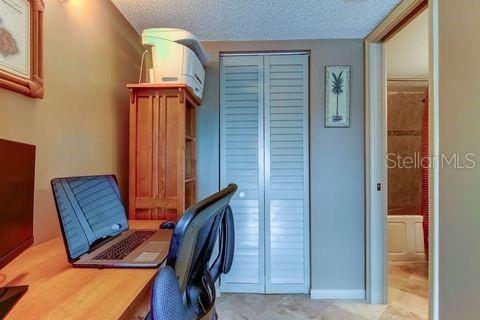 office space with a textured ceiling