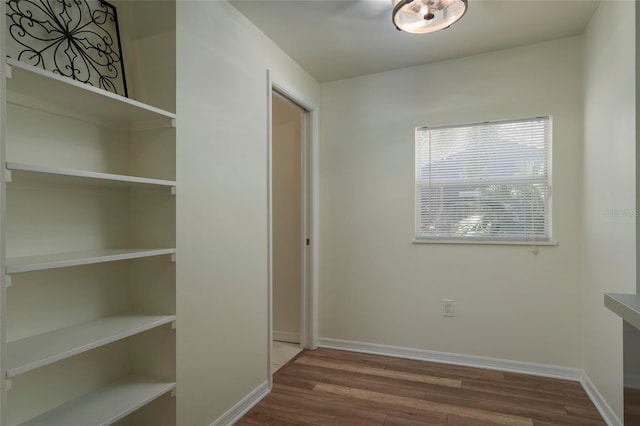 1606 S Arrawana Ave, Tampa, FL 33629 - corridor featuring baseboards and wood finished floors
