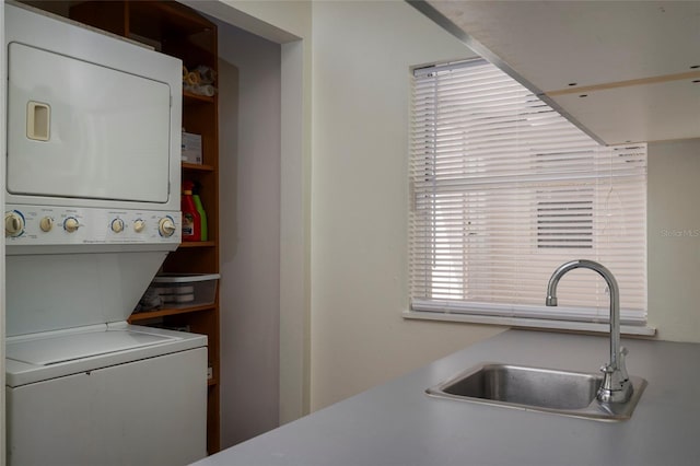 1606 S Arrawana Ave, Tampa, FL 33629 - laundry room with a sink and stacked washer and dryer