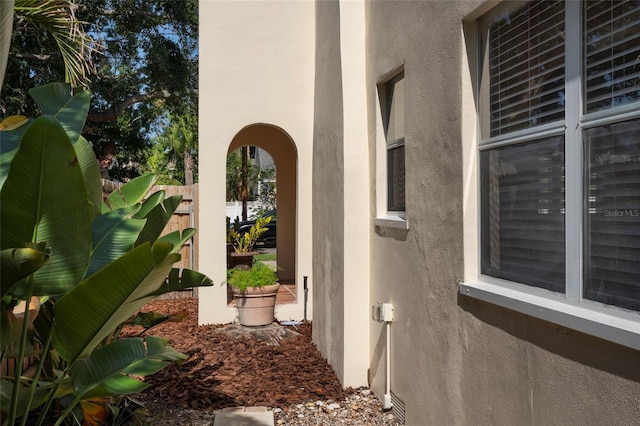 1606 S Arrawana Ave, Tampa, FL 33629 - view of side of property with fence and stucco siding