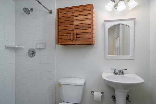 1606 S Arrawana Ave, Tampa, FL 33629 - bathroom featuring toilet, a notable chandelier, and tiled shower