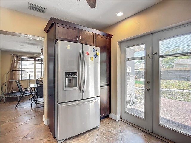 10931 110th Ave, Seminole, FL 33778 - kitchen with stainless steel fridge, ceiling fan, french doors, light tile patterned floors, and recessed lighting