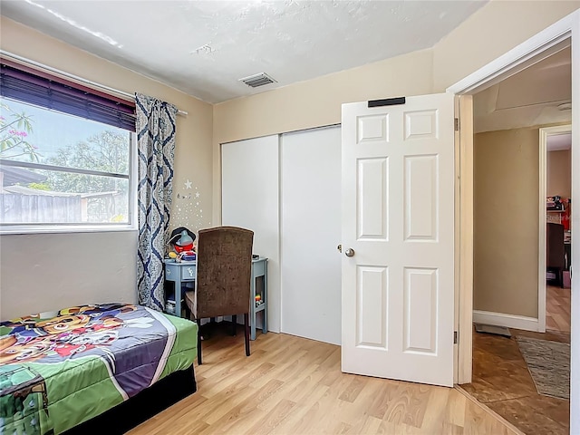 10931 110th Ave, Seminole, FL 33778 - bedroom featuring a closet and light wood-style flooring