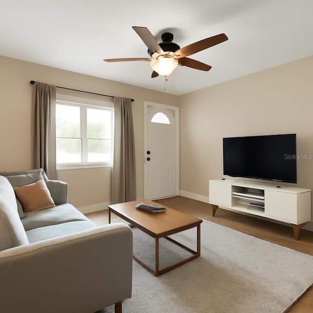 10931 110th Ave, Seminole, FL 33778 - living room featuring baseboards and a ceiling fan
