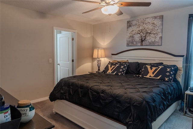 bedroom featuring carpet floors, baseboards, and ceiling fan