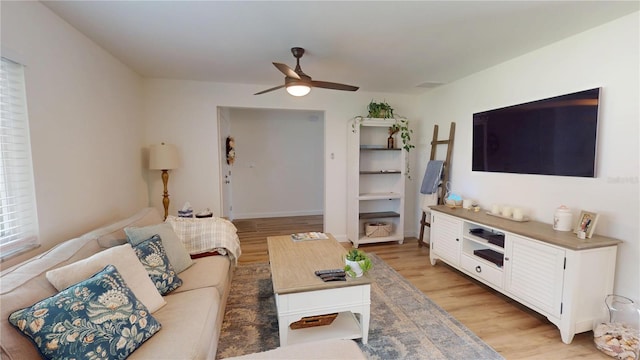 1849 Del Robles Dr, Clearwater, FL 33764 - living area with a ceiling fan and light wood finished floors