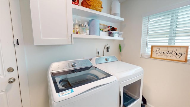 1849 Del Robles Dr, Clearwater, FL 33764 - laundry area featuring washer and clothes dryer and cabinet space