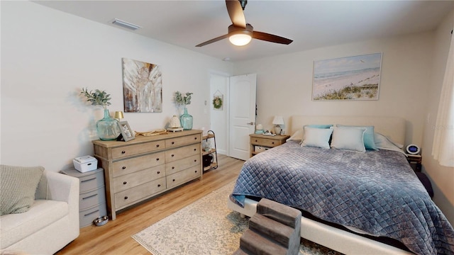 1849 Del Robles Dr, Clearwater, FL 33764 - bedroom with ceiling fan, visible vents, and light wood-style flooring
