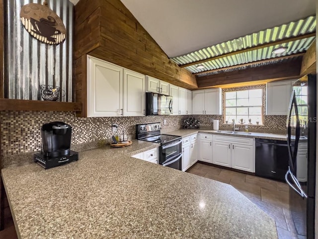 kitchen with high vaulted ceiling, white cabinetry, a sink, backsplash, and black appliances