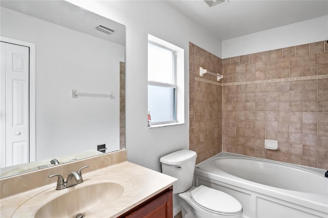 1506 Lenton Rose Ct, Trinity, FL 34655 - bathroom featuring visible vents, washtub / shower combination, toilet, and vanity