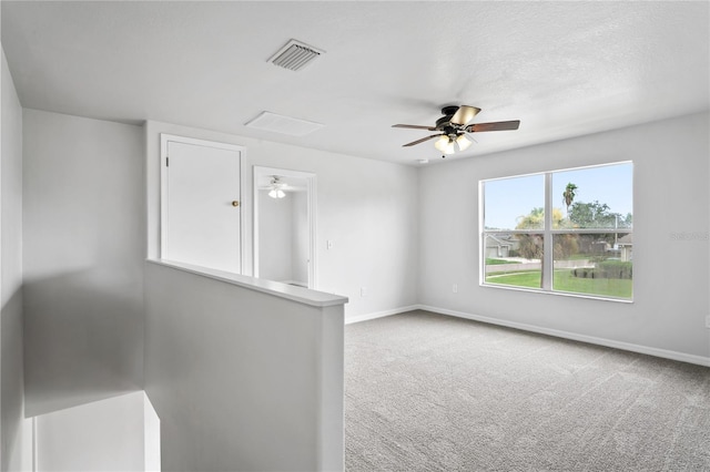1506 Lenton Rose Ct, Trinity, FL 34655 - carpeted spare room with visible vents, a ceiling fan, and baseboards