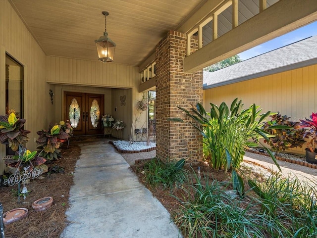 property entrance with french doors and covered porch