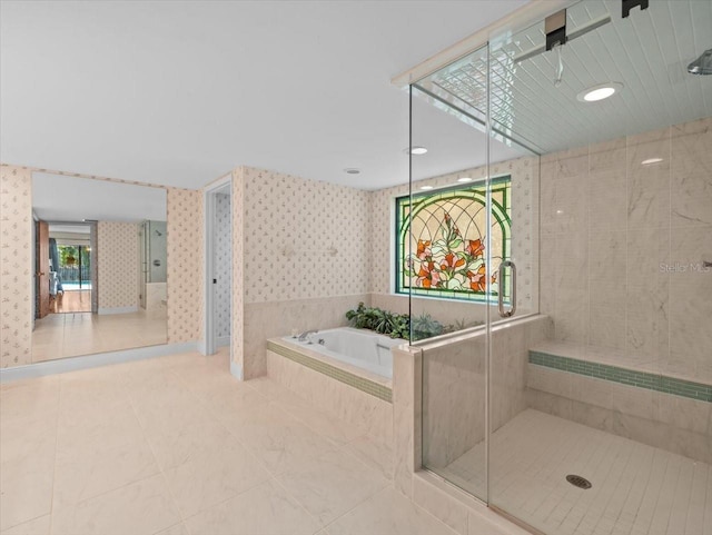 bathroom with tile patterned floors, recessed lighting, wallpapered walls, a bath, and a stall shower