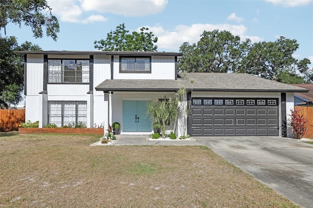 1502 Creekbend Dr, Brandon, FL 33510 - view of front facade featuring an attached garage, fence, a front yard, and concrete driveway