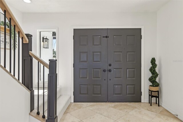 1502 Creekbend Dr, Brandon, FL 33510 - entryway with light tile patterned floors and recessed lighting