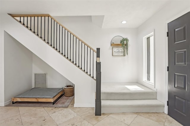 1502 Creekbend Dr, Brandon, FL 33510 - stairs with baseboards, tile patterned flooring, and visible vents